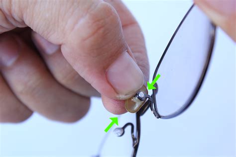 replacing nose pieces on eyeglasses.